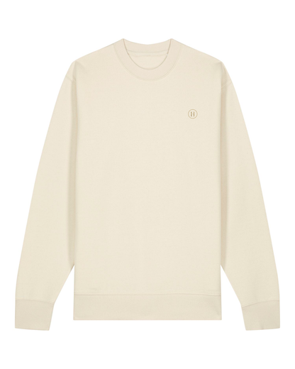 Beige long-sleeve shirt with a small logo on a white background